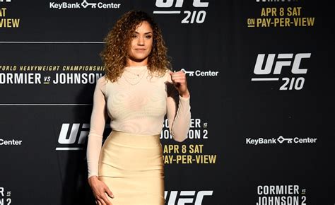 Daniel Cormier Gets Away With Leaning On A Towel While Pearl Gonzalez