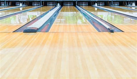 The term bowling alley usually refers to the venue itself, and be at least an appropriate length for the number of lanes, together with whatever else may be part of the establishment (such as a pro shop. 21398091 - bowling alley.with surface polished with wax ...