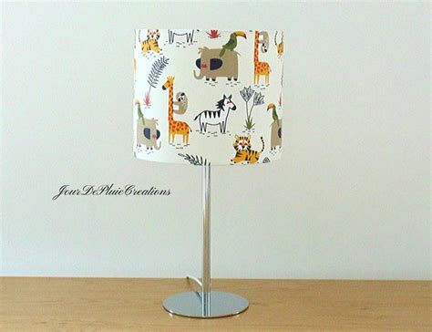 ⠀ leroy merlen has been involved in the. Lampe pied métal blanc ou chrome abat jour safari jungle ...