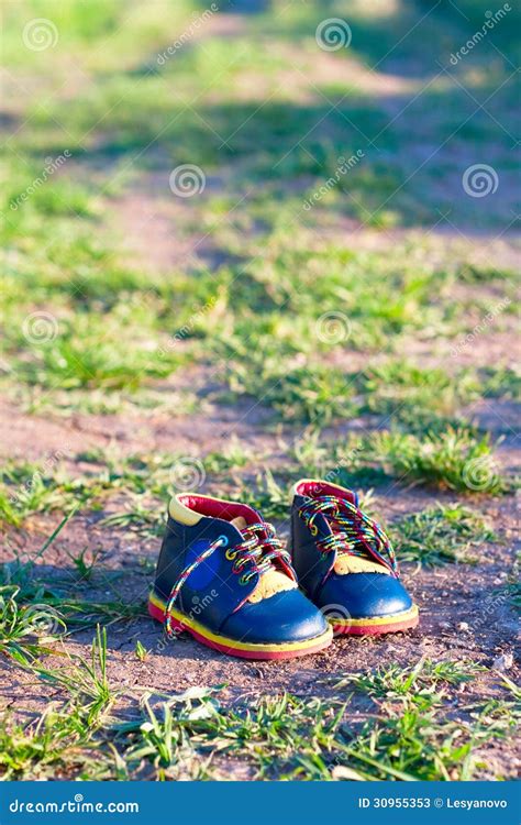 Small Baby Shoes On The Ground Stock Image Image Of Earth Lace 30955353