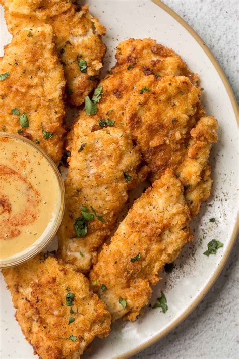 When the buttermilk sauce thickens, remove the pan from the heat and add the crispy fried chicken. Buttermilk Chicken Tenders Recipe Valentina S Corner