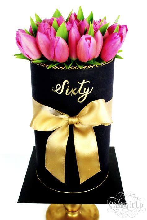 Here are some helpful navigation tips and features. Triple barrel fondant 60th birthday flower box cake with ...