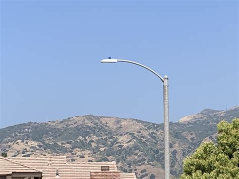 Blue Light On Top Of Recently Installed Led Street Light In Southern