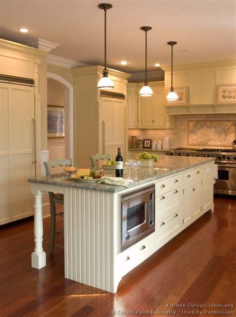 Kitchen islands are a great way to add more seating and counter space. Pictures of Kitchens - Traditional - Off-White Antique ...
