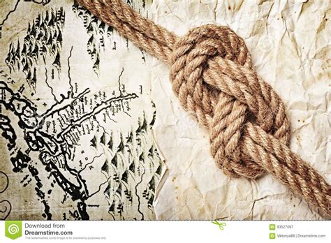 Close Up View Of A Rope Sea Knot On An Old Retro Map Stock Image