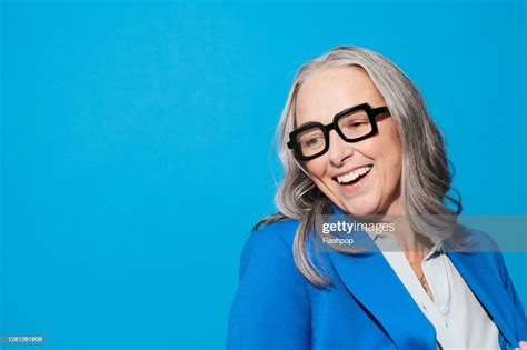 Portrait Of A Confident Successful Happy Mature Woman High Res Stock