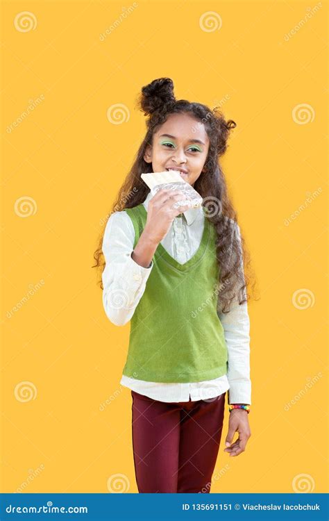 Joyful Cute Girl Holding A Chocolate Bar Stock Image Image Of Eating