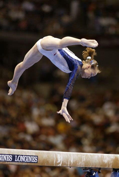 Gymnast Girl On Balance Beam Gymnastics Pictures Gymnastics Images
