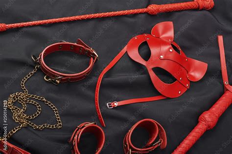 Bdsm Leather Kit Top View Of Red Bdsm Leather Set Handcuffs Whip