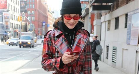 Bella Hadid Is All Smiles While Checking Her Phone Bella Hadid Just Jared