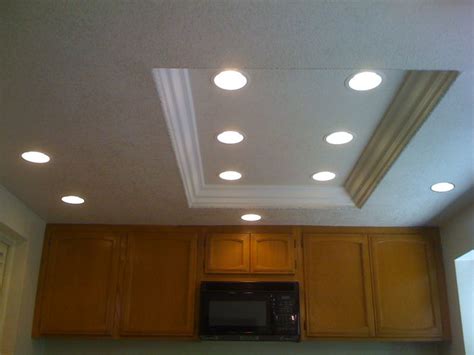 Adding crown moulding inside the soffit is a great way to give it a. How to Update Recessed Fluorescent Lighting in Kitchen in ...