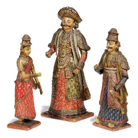 A Group Of Three Indian Polychrome Decorated Wooden Figures