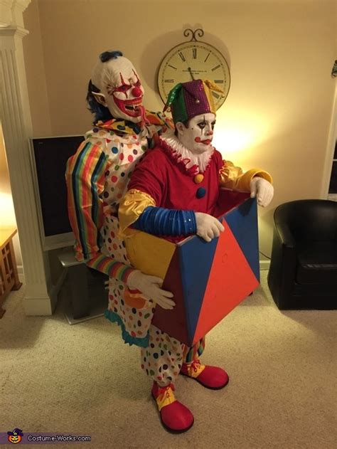 Scary Clown Carrying A Jack In The Box Illusion Costume Photo 55