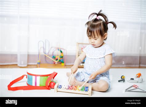 Baby Girl Play Xylophone At Home Stock Photo Alamy