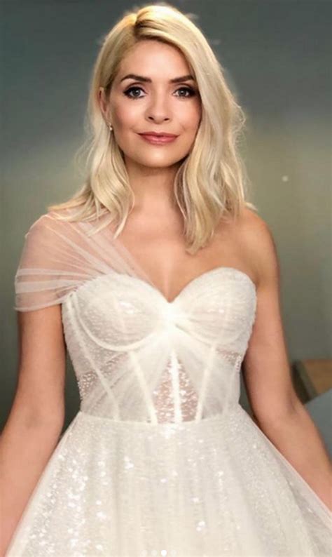 holly willoughby wows in a white strapless dress with feather and sequin detailing for the