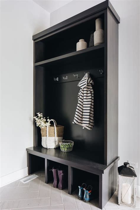 View interior and exterior paint colors and color palettes. Black mudroom cabinet paint color Sherwin Williams SW 6258 ...