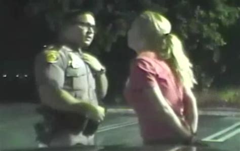 Drunk Woman Tries To Distract Police Officer In The Dumbest Way Possible Video