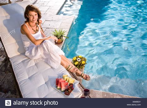 Pool Lounge Chair Woman Relaxing High Resolution Stock Photography And Images Alamy