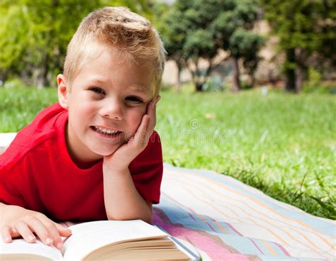 212 Cute Little Boy Reading Picnic Stock Photos Free And Royalty Free
