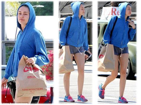 Cheeky Miley Cyrus Shows Off A Little Too Much Derriere In Tiny Hotpants As She Stocks Up On