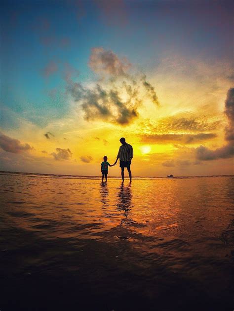 Dad would see himself as a true hero, supporter, and teacher if he could look through his son's eyes. Evening Sunset With Father & Son | Sunrise images, Sunset