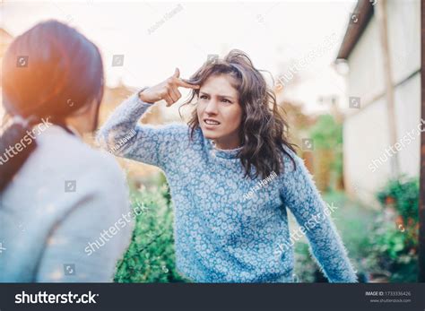 Two Young Women Cursing Quarrel Aggression Stock Photo 1733336426