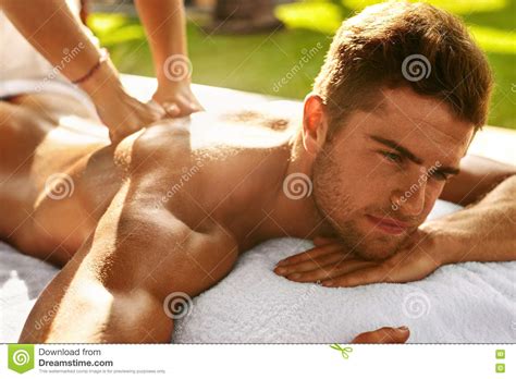 Spa Body Massage Man Enjoying Relaxing Back Massage Outdoors Stock