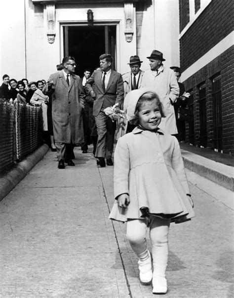 Caroline Kennedy Walks Ahead While Jfk Carries Her Doll 1963