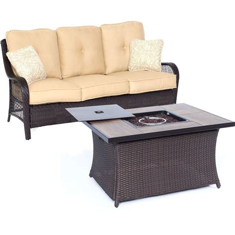 They used the same pavers as the wall for the fire pit. Hanover Orleans 2-Piece All-Weather Wicker Patio Fire Pit ...