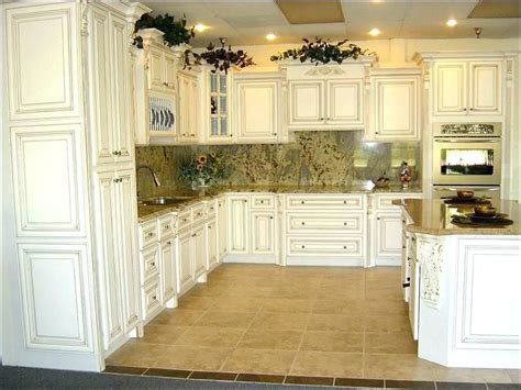 Providing a neutral backdrop, white kitchen cabinets can be left alone or dressed up with colorful art and accessories. Plain And Fancy Cabinets Cost in 2020 | Kitchen cabinets ...