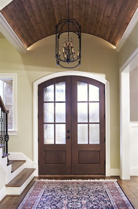 Vaulted ceiling lighting may represent a challenge because it seems like your lighting options are limited. Foyer with beautiful wooden barrel vault ceiling ...