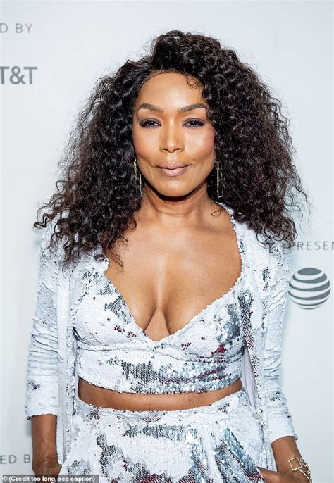 Ageless Angela Bassett Flaunts Cleavage In Shimmery Silver