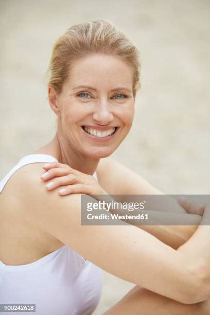 Mature Woman Beach Background Photos And Premium High Res Pictures Getty Images
