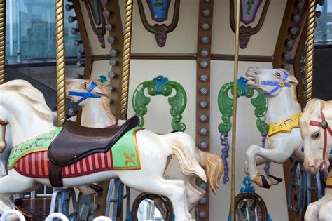 Free Image Of Colorful Decorative Horses On A Carousel