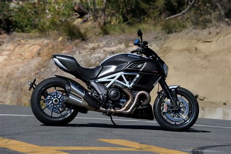 If you're considering the ducati you'll need to decide whether to splash out on the diavel carbon, as tested on the launch. Review: 2014 Ducati Diavel Carbon - Bike Review