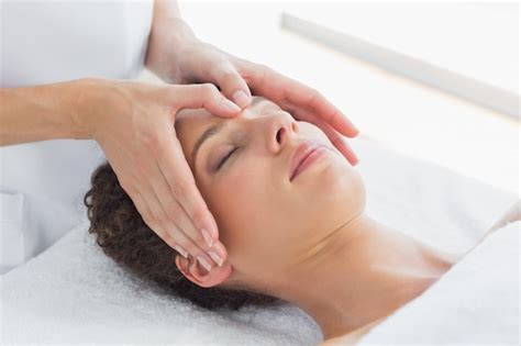 Premium Photo Woman Receiving Massage On Forehead