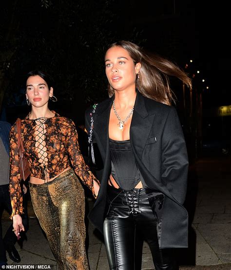 Dua Lipa Flaunts Her Cleavage In A Racy Tie Up Top As She Enjoys A Dinner Date Daily Mail Online