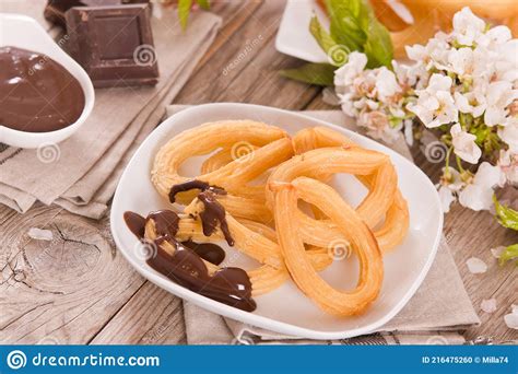 Churros With Chocolate Dipping Sauce Stock Photo Image Of Churro