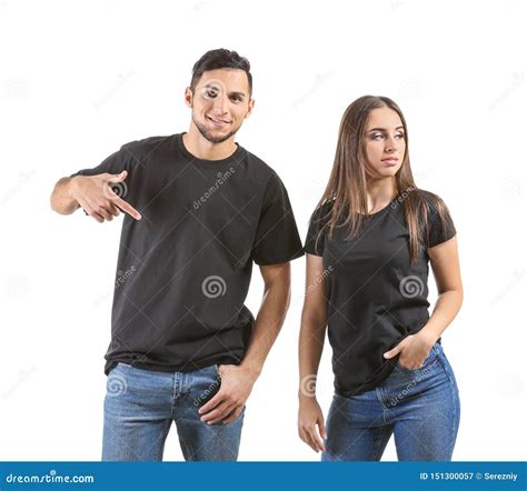Young Man And Woman In Stylish T Shirts On White Background Stock Image