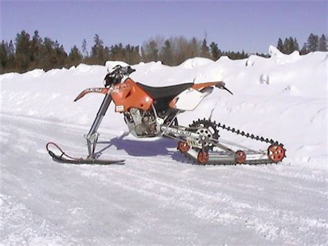 Dirt bikers riding their motocross bikes on snow. Snow Conversion Kit for Dirt Bikes... - Sportbikes.net