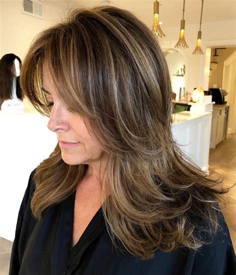 This model has long hair with a lot of layering around the shoulders to give it movement and less weight. 60 Most Prominent Hairstyles for Women Over 40 in 2020 ...