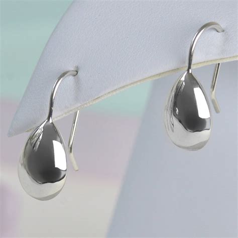 Claire's is proud to offer precious metal earrings in sterling silver and rose gold. sterling silver teardrop earrings by tales from the earth ...