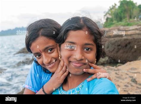 Portrait Of Two Smiling Girls From Andaman Islands India Stock Photo