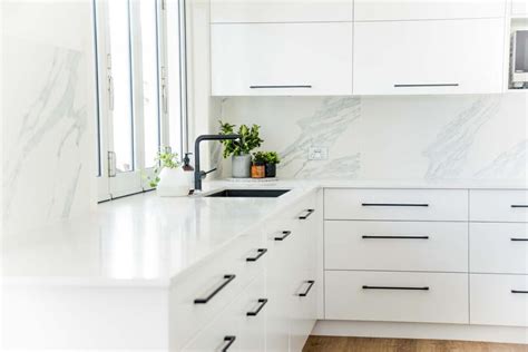 This page is about white cabinets with black hinges,contains cup pulls diy ducklings,joyful abode mom + life + simplicity blogger,black kitchen cabinets with some white accents,vancouver interior designer: Beachside Kitchen Renovation | Greystone Cabinets