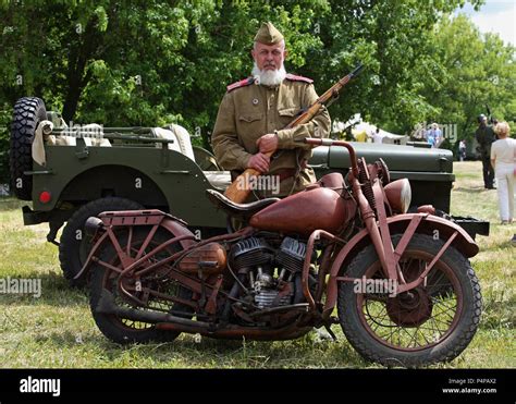 World War Ii Soviet Veteran Wearing A Old Military Uniform With