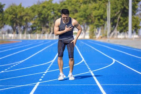 Male Runner Athlete Chest Injury And Pain Stock Photo Image Of Body