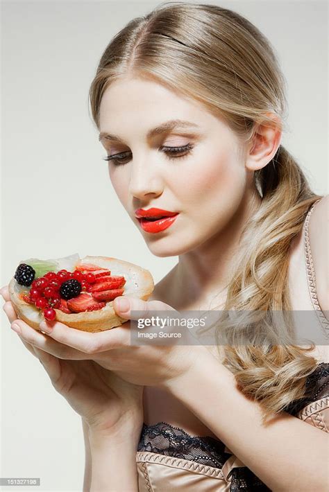 Young Woman Holding Fresh Fruit Tart High Res Stock Photo Getty Images