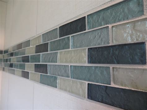 An accent wall will push a certain point in the room forward since it is visually different from the rest for a bathroom that has a strong luxury and elegant vibe, this rather colorful art tiles breathe life to. Linen Textured Tile and Glass Accent Shower Tile ...