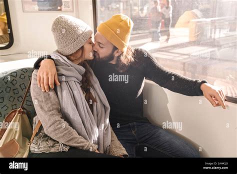 Young Couple Kissing On A Subway Stock Photo Alamy
