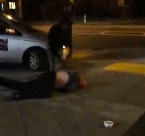 shocking video shows two homeless men fighting in supermarket car park world news mirror